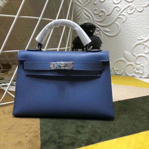 whosale ручного 19см epsom дизайн кожи мини сумка, темно-синий цвет, воск нить, имеет как золото и серебро оборудования, свяжитесь со мной д
whosale ручного 19см epsom дизайн кожи мини сумка, темно-синий цвет, воск нить, имеет как золото и серебро оборудования, свяжитесь со мной д