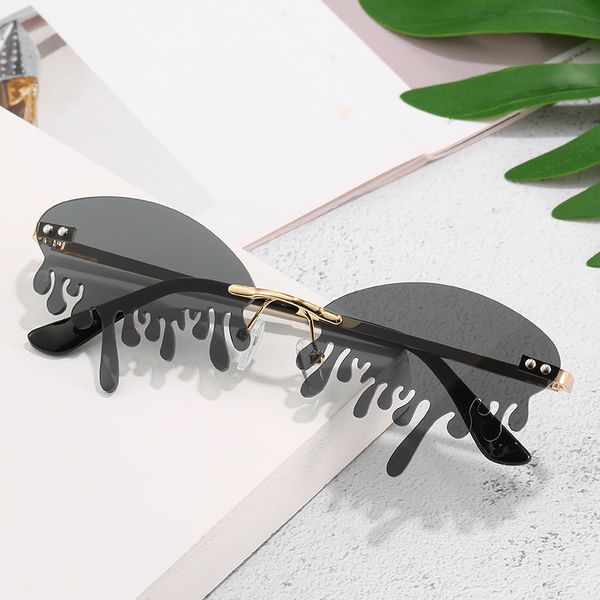 women rimless sunglasses fashion women's retro vintage unique tears shape punk steampunk glasses lady female uv400 oculos 0269, White;black
women rimless sunglasses fashion women's retro vintage unique tears shape punk steampunk glasses lady female uv400 oculos 0269, White;black