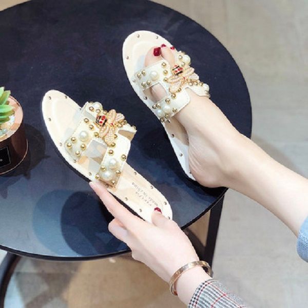 us popular summer fashion designer butterfly pearl studs outside wearing flat beach flip flop slippers for women girls, Black
us popular summer fashion designer butterfly pearl studs outside wearing flat beach flip flop slippers for women girls, Black