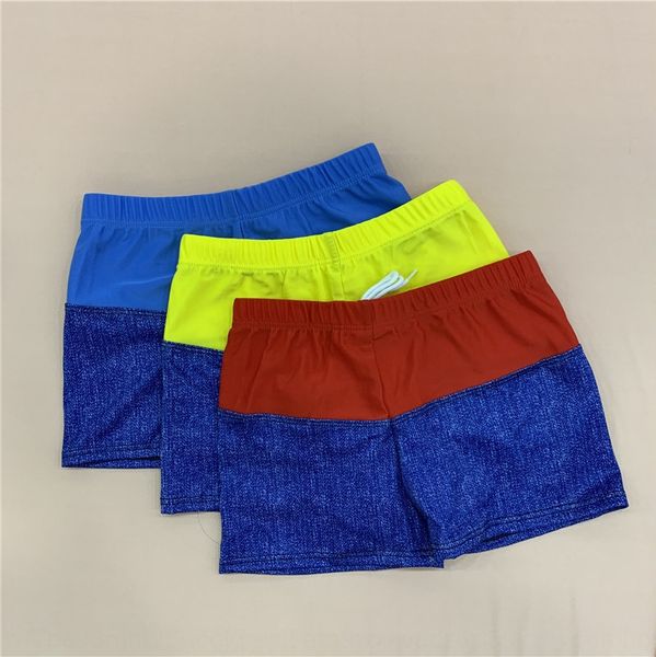 children swimsuit swimming trunks plain boxer spa color panel in the big pupils boys swimwear four corners swimming trunks, Black 
children swimsuit swimming trunks plain boxer spa color panel in the big pupils boys swimwear four corners swimming trunks, Black
