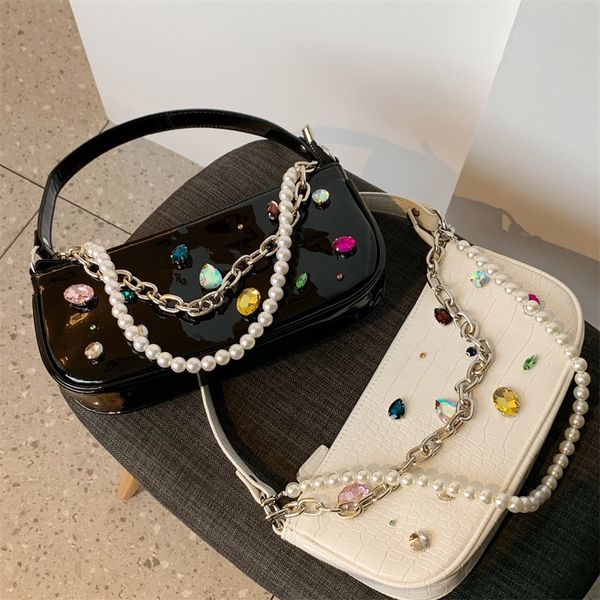 2020 new shoulder bag women's casual fashion korean handbag diamond ladies armpit bag pearl chain
2020 new shoulder bag women's casual fashion korean handbag diamond ladies armpit bag pearl chain
