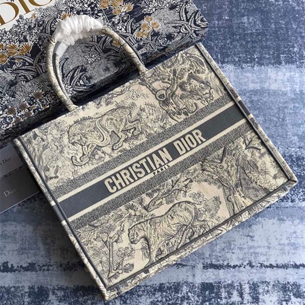 designed for carrying everyday items, this high-capacity tote bag is made of grey embroidered canvas with a variety of patterns and colours
designed for carrying everyday items, this high-capacity tote bag is made of grey embroidered canvas with a variety of patterns and colours