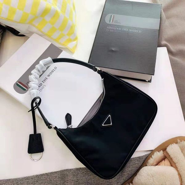 axillary bag classic deluxe black bag brand leather handle nylon tote single-shoulder bag star style handbag 2005 tag l32 g70
axillary bag classic deluxe black bag brand leather handle nylon tote single-shoulder bag star style handbag 2005 tag l32 g70