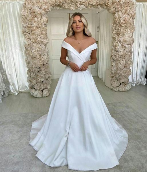 elegant off shoulder wedding dresses satin buttons back a line arabic simple bridal gowns sweep train customize wedding dress, White
elegant off shoulder wedding dresses satin buttons back a line arabic simple bridal gowns sweep train customize wedding dress, White