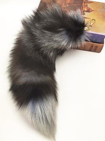 tail car keychain for women/men real fur tail charm tassels/pendants/ornaments/ accessories on bags/shoes/hats/garments, Silver 
tail car keychain for women/men real fur tail charm tassels/pendants/ornaments/ accessories on bags/shoes/hats/garments, Silver