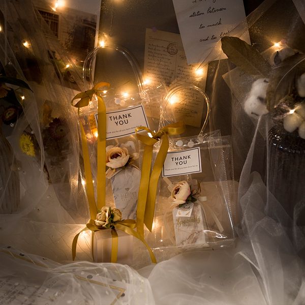 golden luxury pvc clear gift bags transparent tote bags wedding candy boxes gift packaging with handles favors contain
golden luxury pvc clear gift bags transparent tote bags wedding candy boxes gift packaging with handles favors contain