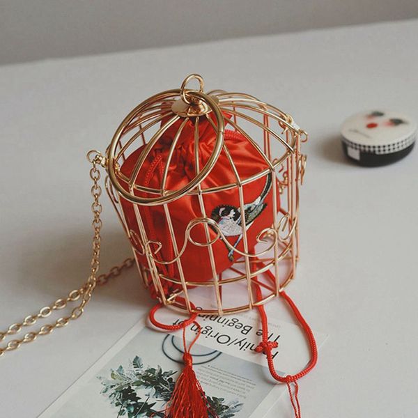 personality bird cage women handbag tote metal cage girls handle bags coin purse fashion party pouch tassel clutch red
personality bird cage women handbag tote metal cage girls handle bags coin purse fashion party pouch tassel clutch red