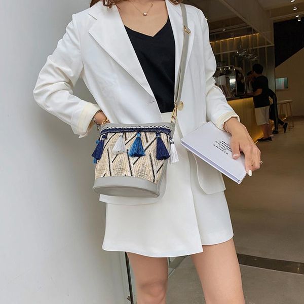 casual ethnic style buckets bag designer straw shoulder bag ribbon tassel beach handbags wide crossbody messenger purses
casual ethnic style buckets bag designer straw shoulder bag ribbon tassel beach handbags wide crossbody messenger purses
