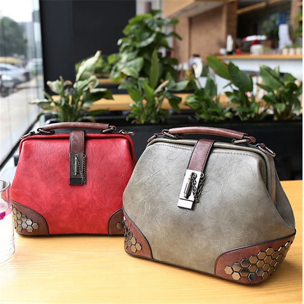 brand original design bag new retro joker lock shoulder bag women's slung rivet
brand original design bag new retro joker lock shoulder bag women's slung rivet