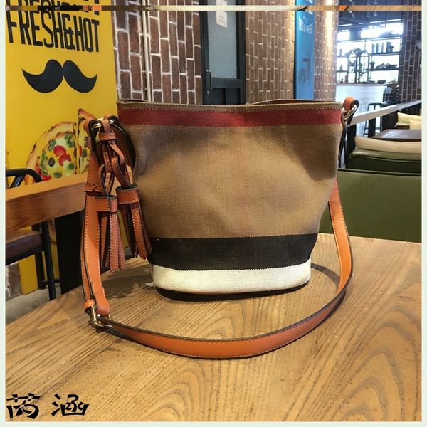 luxury bag women 2020 new striped one-shoulder shoulder bag european and american fashion tassel canvas bucket girl
luxury bag women 2020 new striped one-shoulder shoulder bag european and american fashion tassel canvas bucket girl