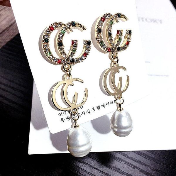 south korea's new s925 silver pin alphabet personality wild full diamond pearl earrings net red ear round tide suitable for round face
south korea's new s925 silver pin alphabet personality wild full diamond pearl earrings net red ear round tide suitable for round face