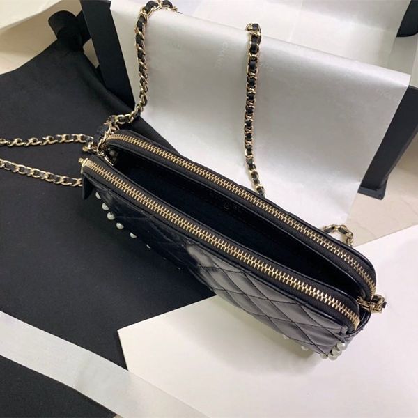 the new 2020 faux pearl chain fashion wallet with multiple card slots in the middle can fit into the iphone11 pro max
the new 2020 faux pearl chain fashion wallet with multiple card slots in the middle can fit into the iphone11 pro max