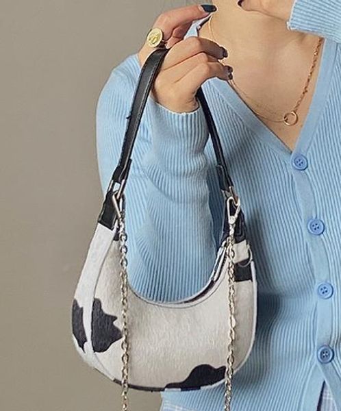 design mini cow pattern crescent bag 2020 new fashion one-shoulder underarm bag selling portable messenger bag
design mini cow pattern crescent bag 2020 new fashion one-shoulder underarm bag selling portable messenger bag