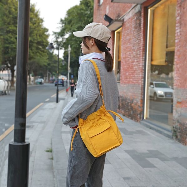 korean bucket messenger canvas shoulder style solid color diagonal canvas women's literary ins simple diagonal bag bucket bag, White 
korean bucket messenger canvas shoulder style solid color diagonal canvas women's literary ins simple diagonal bag bucket bag, White