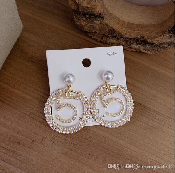 2020 new selling pearl circle earrings female advanced sense french wild korean net red number 5 silver stud earrings earrings, Golden;silver
2020 new selling pearl circle earrings female advanced sense french wild korean net red number 5 silver stud earrings earrings, Golden;silver