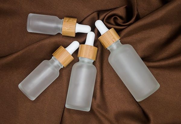 10 15ml 20 30ml frosted glass dropper bottle with bamboo lid cap essential oil glass bottle frosted green perfume bottle dhl ahe410
10 15ml 20 30ml frosted glass dropper bottle with bamboo lid cap essential oil glass bottle frosted green perfume bottle dhl ahe410