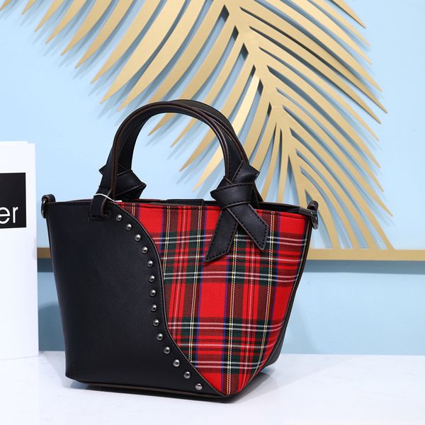 new designers rivet ковш сумка для женщин холста лоскутных кожаных сумок и кошельков высокого качества способа повелительниц мешки плечи
new designers rivet ковш сумка для женщин холста лоскутных кожаных сумок и кошельков высокого качества способа повелительниц мешки плечи