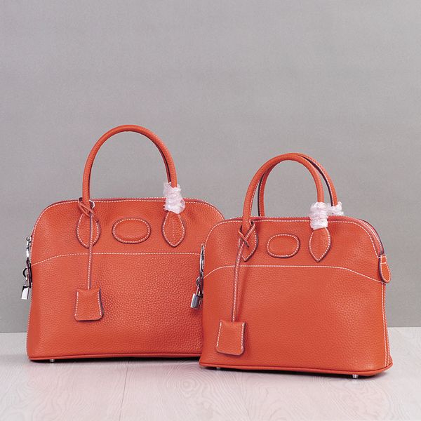 women's bag 2009 european and american trend litchi grained bovine leather hand-held shell bag
women's bag 2009 european and american trend litchi grained bovine leather hand-held shell bag