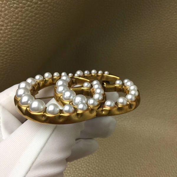 vintage pearl diamond letter brooch 2019 explosion models bronze fine letter brooch, Gray
vintage pearl diamond letter brooch 2019 explosion models bronze fine letter brooch, Gray