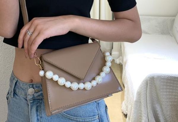 designer female bag 2020 new trendy fashion all-match bead string messenger small fresh one-shoulder handbag
designer female bag 2020 new trendy fashion all-match bead string messenger small fresh one-shoulder handbag
