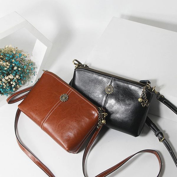 new leather handbags oil wax cowhide mini bag casual simple shoulder messenger bag
new leather handbags oil wax cowhide mini bag casual simple shoulder messenger bag