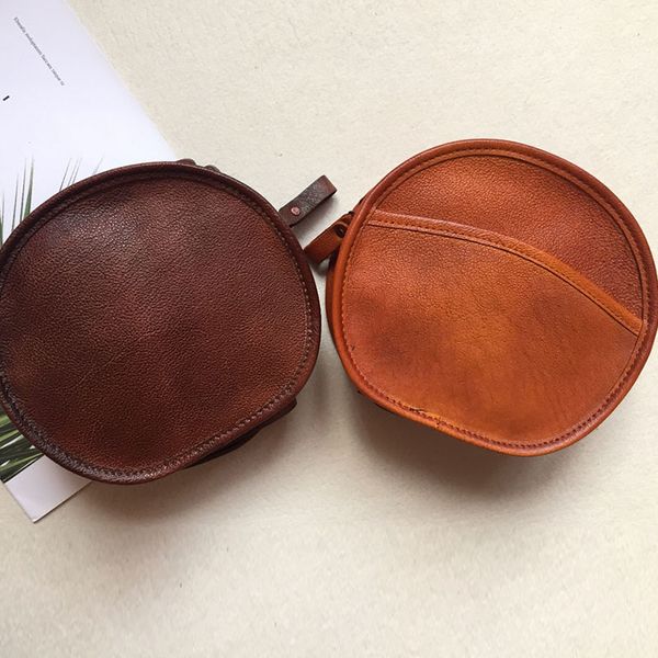 the first layer of leather small round bag leather mini bag small shoulder casual shoulder
the first layer of leather small round bag leather mini bag small shoulder casual shoulder