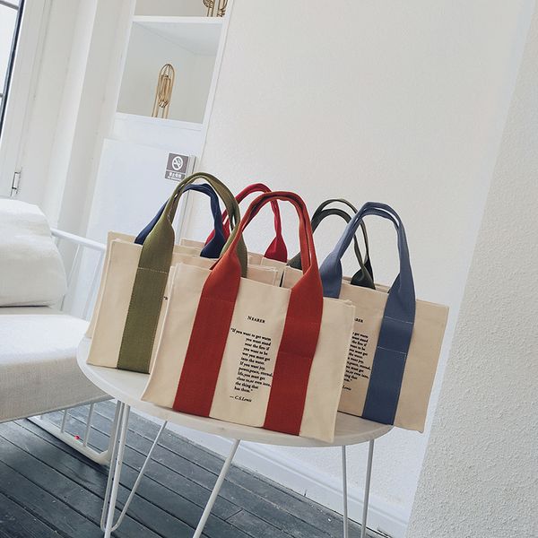 new japanese literary alphabet canvas bag female portable work mini lunch bag lunch box shoulder hand bags
new japanese literary alphabet canvas bag female portable work mini lunch bag lunch box shoulder hand bags
