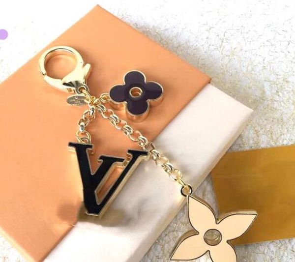 2020 exquisite four-leaf flower letter keychain multi pendant bag charm fashion key chain designer keychain keyring, Silver
2020 exquisite four-leaf flower letter keychain multi pendant bag charm fashion key chain designer keychain keyring, Silver