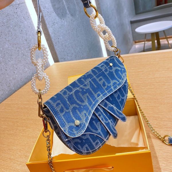 мода женщин сумка ретро pearl заклепка сумка указано одно плечо saddle bag джинсовый холст mini square посыльного сумки сумки crossbody
мода женщин сумка ретро pearl заклепка сумка указано одно плечо saddle bag джинсовый холст mini square посыльного сумки сумки crossbody