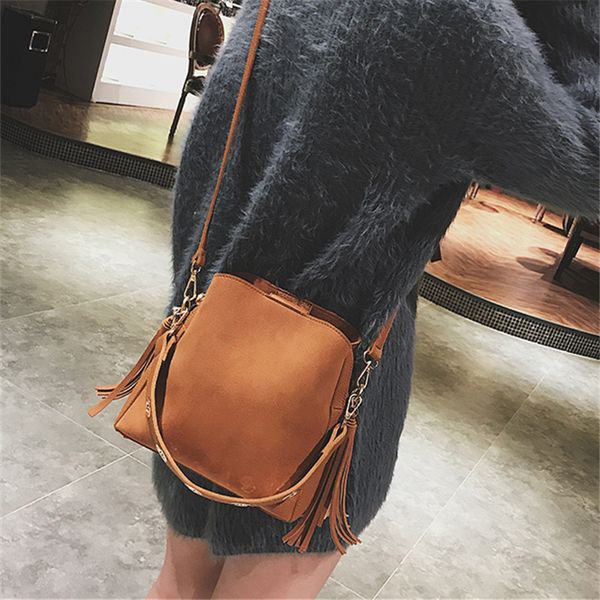 2020 fashion scrub women bucket bag vintage tassel messenger bag retro shoulder simple crossbody tote
2020 fashion scrub women bucket bag vintage tassel messenger bag retro shoulder simple crossbody tote