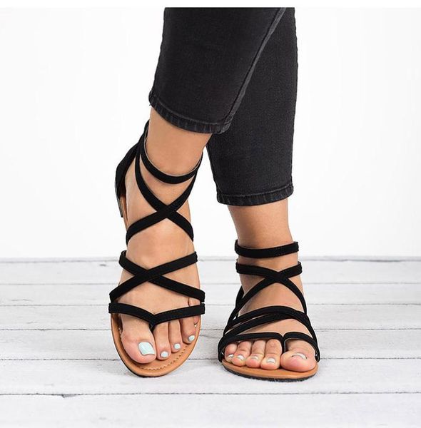summer flip flops gladiator sandals beach shoes cross sandals woman slip on flats casual women black brown shoes plus size 34-43 
summer flip flops gladiator sandals beach shoes cross sandals woman slip on flats casual women black brown shoes plus size 34-43