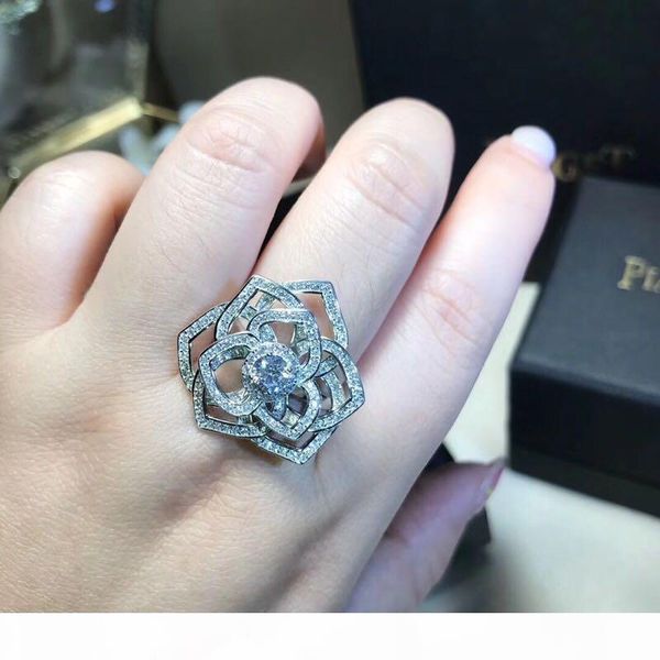 роскошный известный классический s925 sterling silver полный кристалл hollow розы большой обручальное кольцо для женщин ювелирные изделия
роскошный известный классический s925 sterling silver полный кристалл hollow розы большой обручальное кольцо для женщин ювелирные изделия