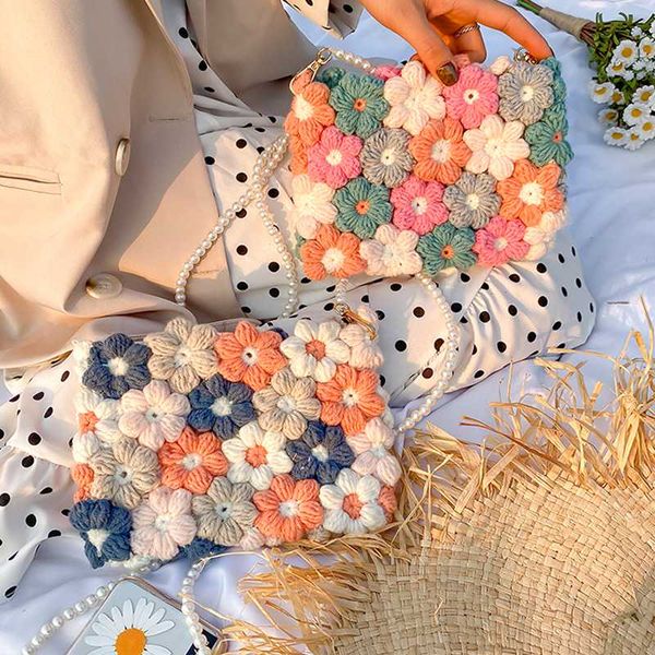fashion hand-woven daisy women's shoulder bag pearls chain flowers women crossbody messenger bags crochet knitted women handbag
fashion hand-woven daisy women's shoulder bag pearls chain flowers women crossbody messenger bags crochet knitted women handbag