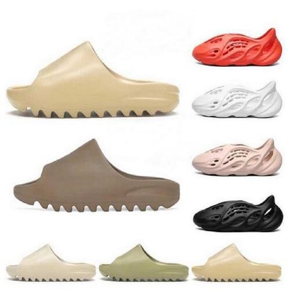 with box kanye slides men women slippers foam runner slide resin bone desert sand triple black fashion men slides beach 36-45
with box kanye slides men women slippers foam runner slide resin bone desert sand triple black fashion men slides beach 36-45