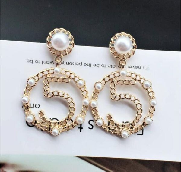 2018 autumn and winter new european and american letters 5 pearl circle earrings personality exaggerated tide earrings retro hollow earrings
2018 autumn and winter new european and american letters 5 pearl circle earrings personality exaggerated tide earrings retro hollow earrings