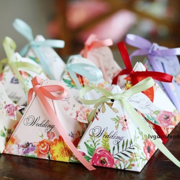 floral triangular wedding gift boxes candy boxes with ribbons pyramid gifts candy box for guests wedding decoration 50pcs/pack
floral triangular wedding gift boxes candy boxes with ribbons pyramid gifts candy box for guests wedding decoration 50pcs/pack
