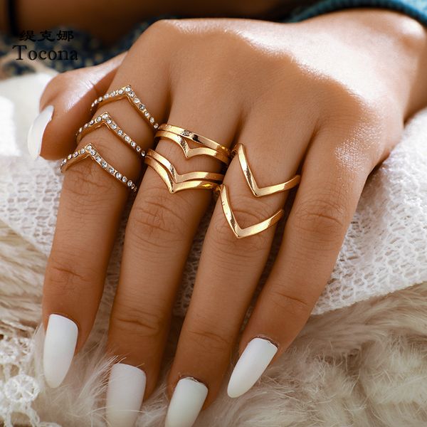 fashion 5pcs/sets wave gold rings sets clear crystal simple gold alloy metal charming rings for women accessories 9017, Golden;silver
fashion 5pcs/sets wave gold rings sets clear crystal simple gold alloy metal charming rings for women accessories 9017, Golden;silver