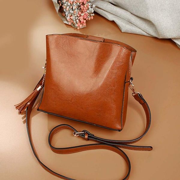 women handbag bucket bag vintage tassel fashion shoulder bags retro casual messenger bag ladies cross bags
women handbag bucket bag vintage tassel fashion shoulder bags retro casual messenger bag ladies cross bags