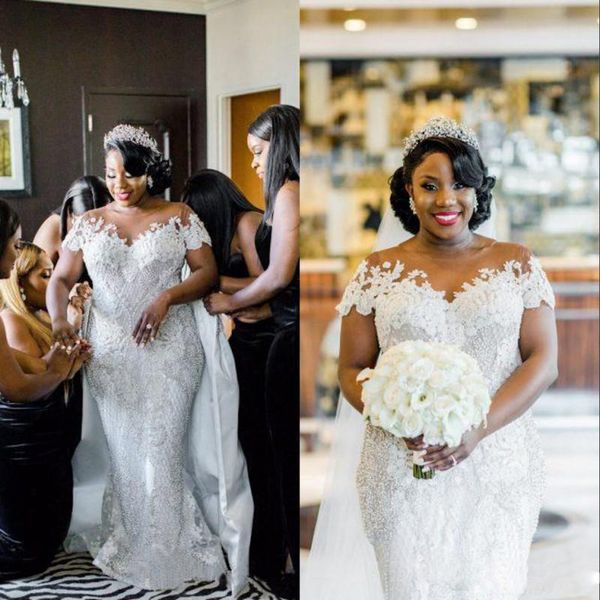 plus size luxurious lace 2020 arabic wedding dresses cap sleeves pearls beading bridal dress gorgeous wedding gowns, White
plus size luxurious lace 2020 arabic wedding dresses cap sleeves pearls beading bridal dress gorgeous wedding gowns, White