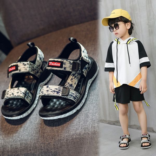 2020 new children's magic and flying sandals casual soft bottom magic sticker boy sandals, Black;red
2020 new children's magic and flying sandals casual soft bottom magic sticker boy sandals, Black;red