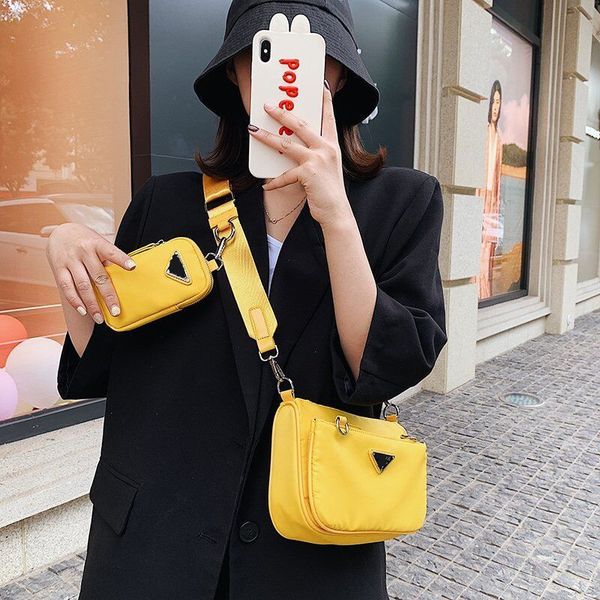 purse 2020 new nylon cloth bag three-in-one shoulder messenger bag hand carry mahjong bag under the arm leather luggage tag
purse 2020 new nylon cloth bag three-in-one shoulder messenger bag hand carry mahjong bag under the arm leather luggage tag