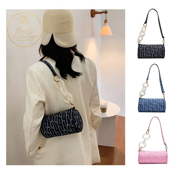 2020 new summer female pearl chain button fashion design strap denim baguette shouler bag women mini beach cotton armpit bag
2020 new summer female pearl chain button fashion design strap denim baguette shouler bag women mini beach cotton armpit bag