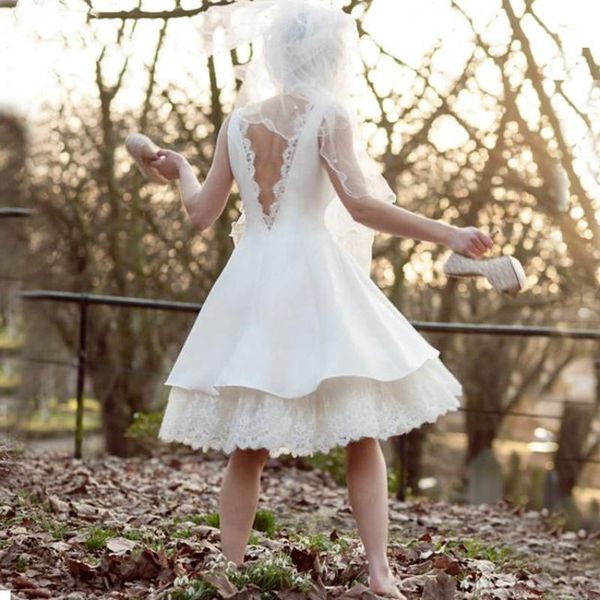 setwell jewel a-line wedding dresses sleeveless backless lace appliques tea length tiered satin novia bridal gowns, White
setwell jewel a-line wedding dresses sleeveless backless lace appliques tea length tiered satin novia bridal gowns, White
