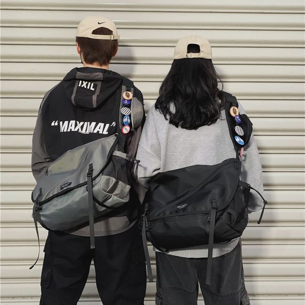messenger bag male and female fashion brand large capacity postman work bag hip-hop individual shoulder bag
messenger bag male and female fashion brand large capacity postman work bag hip-hop individual shoulder bag