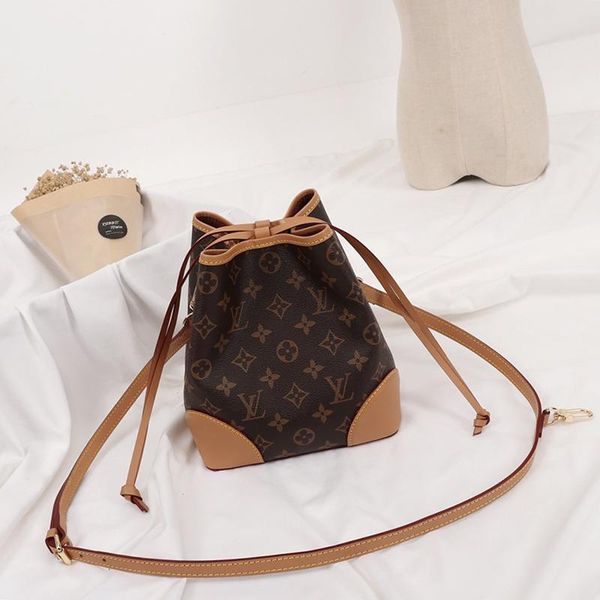 new arrival womens leather bucket bag vintage classic drawstring shoulder bag simple style lady messenger crossbody bags bolsa de hombro
new arrival womens leather bucket bag vintage classic drawstring shoulder bag simple style lady messenger crossbody bags bolsa de hombro