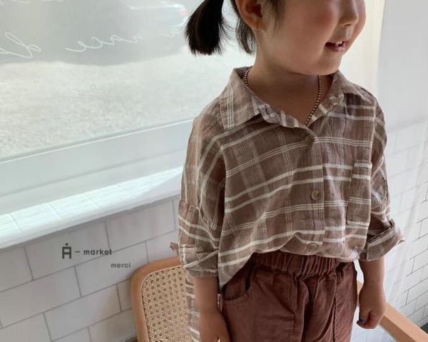 2019 autumn children's cotton linen cotton and linen plaid children's loose shirt boys and girls long sleeve shirt, White;black
2019 autumn children's cotton linen cotton and linen plaid children's loose shirt boys and girls long sleeve shirt, White;black