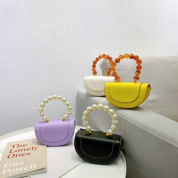 2020 summer mini purses hand bag pearl acrylic beadings handle portable saddle bag fashion semicircle female tide pu leather
2020 summer mini purses hand bag pearl acrylic beadings handle portable saddle bag fashion semicircle female tide pu leather