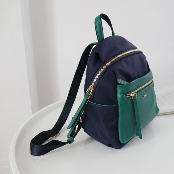 contrast color ultra light nylon nylon cloth cloth with cowhide backpack multi-layer large size small backpack female
contrast color ultra light nylon nylon cloth cloth with cowhide backpack multi-layer large size small backpack female