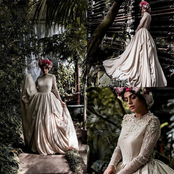 modern beige arab dubai wedding dresses jewel satin long sleeves appliques lace beaded bridal gown designer wedding dress custom made, White
modern beige arab dubai wedding dresses jewel satin long sleeves appliques lace beaded bridal gown designer wedding dress custom made, White