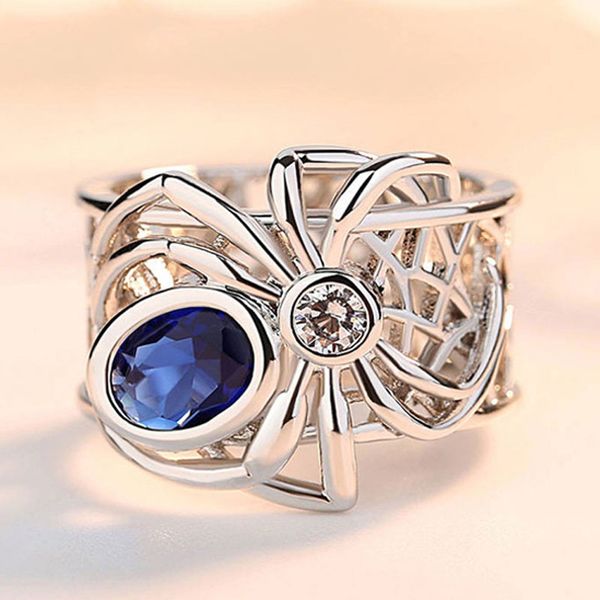 hpxmas hollow spin ring blue crystal stone cubic zirconia romantic jewelry for women white gold color wedding party jewelry, Golden;silver 
hpxmas hollow spin ring blue crystal stone cubic zirconia romantic jewelry for women white gold color wedding party jewelry, Golden;silver